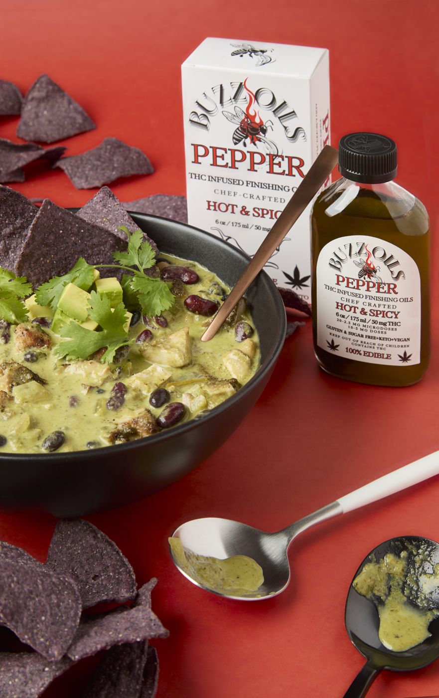 Buzz Oils Pepper with guacamole and blue corn chips