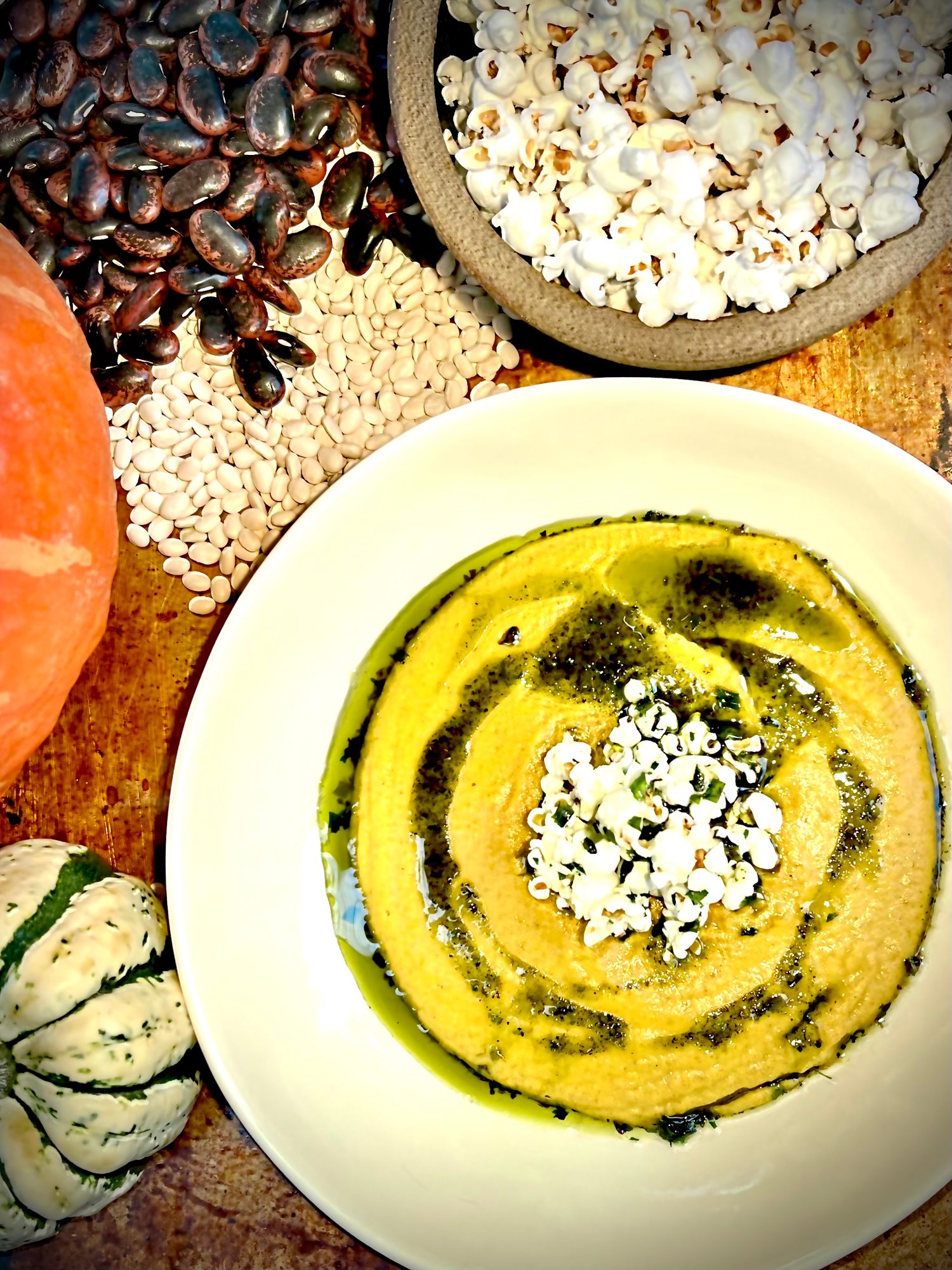 Squash soup styled with beans